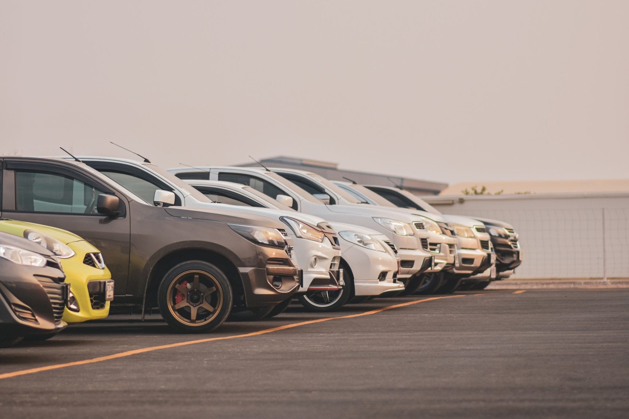 cars parked at a private auto auction